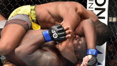 Ciryl Gane - Jailton Almeida dominates Derrick Lewis on mat, wins at UFC Sao Paulo - ESPN - espn.com - Brazil