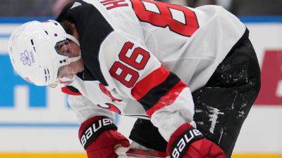 Devils' Jack Hughes 'week-to-week' with upper-body injury - ESPN
