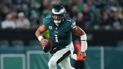 Eagles survive Cowboys' final drive to win thrilling NFC East battle