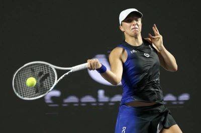 WTA Finals: Swiatek defeats Sabalenka to reach final and keep alive hopes of No 1 return