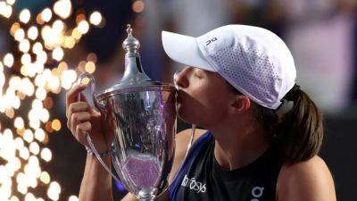 Swiatek wins WTA Finals, regains world number one ranking