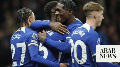 Jackson treble fires Chelsea to chaotic victory over nine-man Spurs