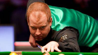 Jordan Brown shocks John Higgins in China to reach quarter-finals