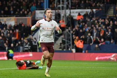 Jack Grealish puts Manchester City back on track with battling win over Luton