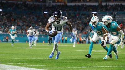 Tennessee Titans and New York Giants pull off upsets against Miami Dolphins and Green Bay Packers