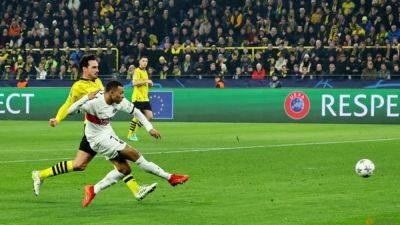 PSG snatch knockout stage spot with 1-1 draw at Dortmund