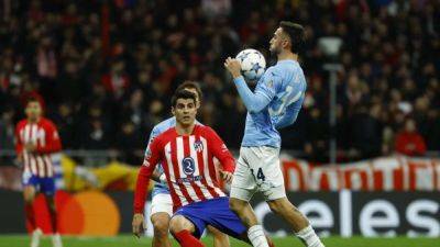 Atletico Madrid win group after 2-0 win over Lazio