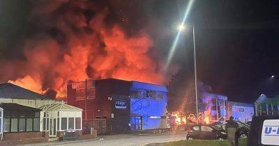 One person unaccounted for after huge fire in Treforest and 'explosions like an earthquake' leave building at risk of collapse