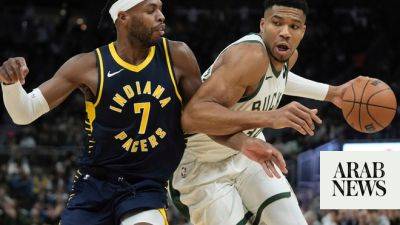 Antetokounmpo scores franchise-record 64 points to help Bucks beat Pacers 140-126