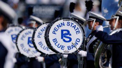 Former Penn State marching band member claims sexual, gender-based harassment by coach in lawsuit