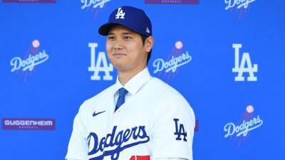 Shohei Ohtani, formally introduced by Dodgers, avoids surgery talk - ESPN