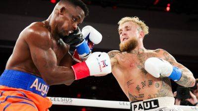 Jake Paul - Tyron Woodley - Ariel Helwani - Jake Paul knocks out Andre August in first round, waves goodbye to opponent on mat - foxnews.com - Usa