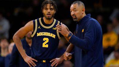 Michigan's Juwan Howard cleared to coach after surgery, review - ESPN