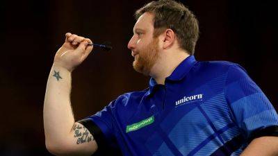 Double taps - plumber Menzies into World Championship second round