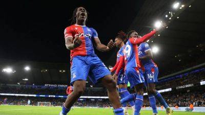 Olise's late penalty gives Crystal Palace unexpected 2-2 draw with Manchester City