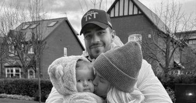 Tommy Fury's two-word message as he cosies up with Molly-Mae Hague and their daughter after 'clash'