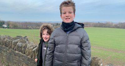Hero boy, 9, saved brother who became 'trapped between a wall and radiator' during epileptic seizure