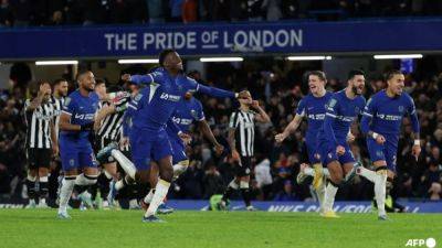 Chelsea back from brink to reach League Cup semis