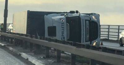 LIVE: M60 traffic STOPPED after lorry overturns in Storm Pia - latest updates
