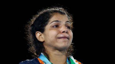 Top Indian female wrestler quits in protest over new president of wrestling body