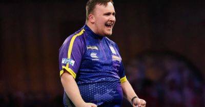 Luke Littler continues dream World Championship with victory over Andrew Gilding