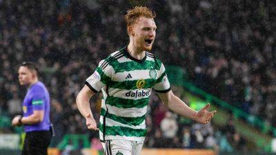 Liam Scales heads Celtic to victory over Livingston