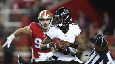 Ravens' Lamar Jackson trips over referee, called for penalty in bizarre play vs 49ers
