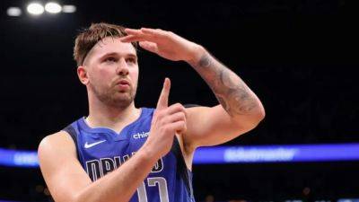 Doncic dazzles in Mavs win, Celtics top Lakers in NBA Christmas clash