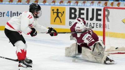 Connor Bedard - Celebrini's 5 points power Canada to blowout win over Latvia at world juniors - cbc.ca - Sweden - Finland - Canada - Latvia - county Halifax