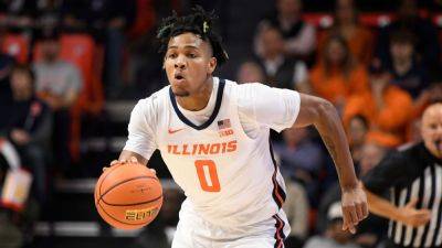 Illinois' Terrence Shannon Jr. charged with rape, suspended - ESPN