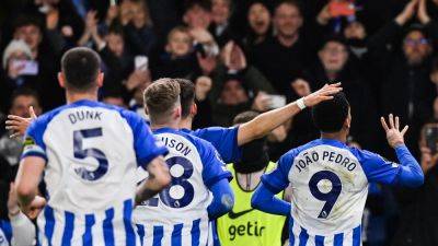 Rampant Brighton hold off late rally to sink Spurs