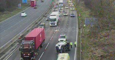 LIVE: Huge delays on M62 as car overturns with police and paramedics at the scene - latest updates