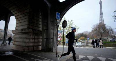 British man injured and German tourist killed in suspected Paris terror attack
