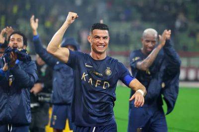 Cristiano Ronaldo ends 2023 with 54 goals as Al Nassr ease past Al Taawoun - in pictures