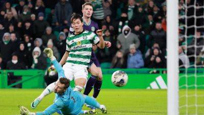 Scotland: Celtic hammer Hibs, Rangers edge Hearts