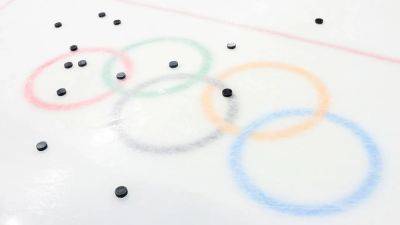 Olympic hockey players must wear neck guards after IIHF ruling in wake of Adam Johnson's death - foxnews.com - Britain - Usa - Washington