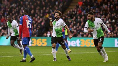 Mo Salah - Harvey Elliott - Jean Philippe Mateta - Mo Salah nets 200th goal as Liverpool battle back to beat 10-man Crystal Palace - rte.ie - Jordan - Liverpool