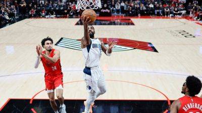 Luka Doncic - Jason Kidd - Mavericks' Kyrie Irving remains 'in great spirits' after suffering foot injury in win over Trail Blazers - foxnews.com - Usa - county Dallas - county Maverick