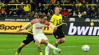 Borussia Dortmund - Bayer Leverkusen - Mats Hummels - Gregor Kobel - Christoph Baumgartner - Leipzig beat 10-man Dortmund 3-2 in battle for fourth spot - channelnewsasia.com - Germany