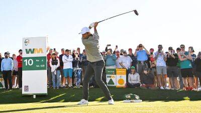 Scottie Scheffler leads at Phoenix Open as Rory McIlroy impresses before play is suspended