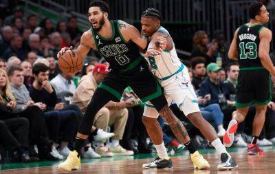 Tatum powers Celtics over Hornets, Bucks notch 10th straight win