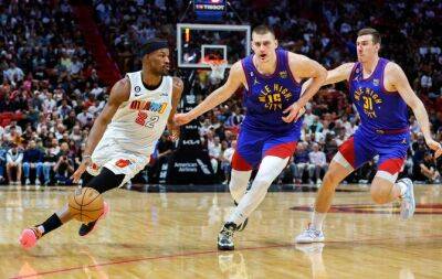Jokic leads Nuggets over Heat, Mitchell sparks Cavs