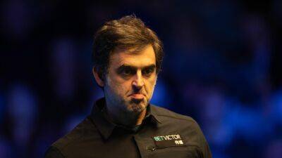 Ad However - Ronnie O’Sullivan overcomes tip problems and forfeited frame to beat Ross Muir in dramatic Welsh Open match - eurosport.com