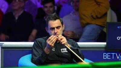 Ronnie O'Sullivan bites tip off cue as he crashes out of Welsh Open to Tian Pengfei