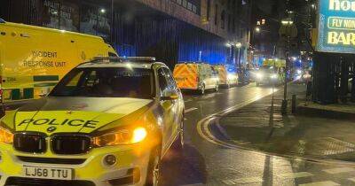 Huge emergency services response near Gay Village as man rescued after falling from bridge into canal - manchestereveningnews.co.uk - Manchester