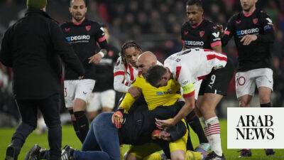 UEFA opens inquiry into fan attack on Sevilla goalkeeper