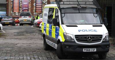 Police spend second day searching commercial unit after armed swoop - manchestereveningnews.co.uk - Manchester