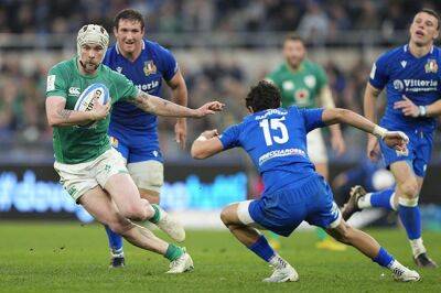 Ireland beat spirited Italy to keep Six Nations Grand Slam bid alive