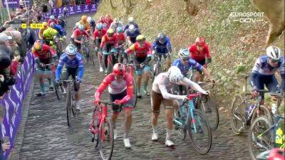 Riders forced to WALK up climb as wet cobbles cause ‘absolute chaos’ at Omloop Het Nieuwsblad - eurosport.com - Netherlands