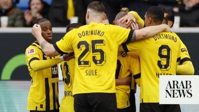 Freak Brandt goal sinks Hoffenheim as Dortmund go three points clear
